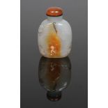 A 19th century Chinese well hollowed agate snuff bottle. Carved in low relief to depict a sage and a