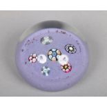 A Paul Ysart paperweight set with five complex canes on a lilac speckled ground, Harland period, 7.