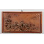 Giuseppe Bianchi (19th / 20th century Italian). A framed carved walnut panel, decorated in high