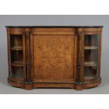 A Victorian inlaid figured walnut credenza. With gilt metal mounts and ebonized mouldings, 168cm