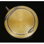 A George V silver powder compact by Horton & Allday. Circular in form and with yellow guilloche