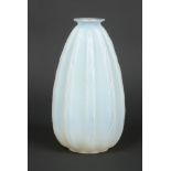 An Art Deco Sabino opaline glass vase of reeded teardrop form. Moulded with stylized bands in the