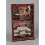 A 20th century Chinese hardwood wall mounting collectors cabinet, 81.5cm.