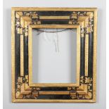 An 18th century Continental cushion shaped gilt and ebonized picture frame, outer dimensions, 59cm x