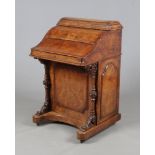 A Victorian burr walnut jack in the box davenport writing desk. Inlaid, with fitted interior, open