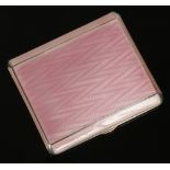 A George V ladies silver and pink guilloche enamel cigarette case by Deakin & Francis. Assayed