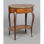 A 19th century French marquetry two tier single drawer occasional table with ormolu mounts.