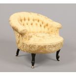 A Victorian tub chair with deep buttoned upholstery.Condition report intended as a guide only.