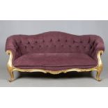 A William IV Rococo style giltwood three seater settee possibly by Gillows of Lancaster. With deep