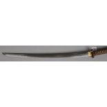 A World War II period Japanese officers Samurai sword in leather mounted scabbard. With pierced