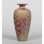 A Burmantofts Faience lustre vase of high shouldered form by Joseph Walmsley. Decorated over a red