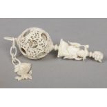 An early 20th century Cantonese carved ivory seven piece puzzle ball. Carved with figures in a