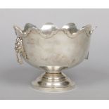 A George V silver rose bowl by Walker & Hall. With scalloped rim and lion mask handles. Assayed