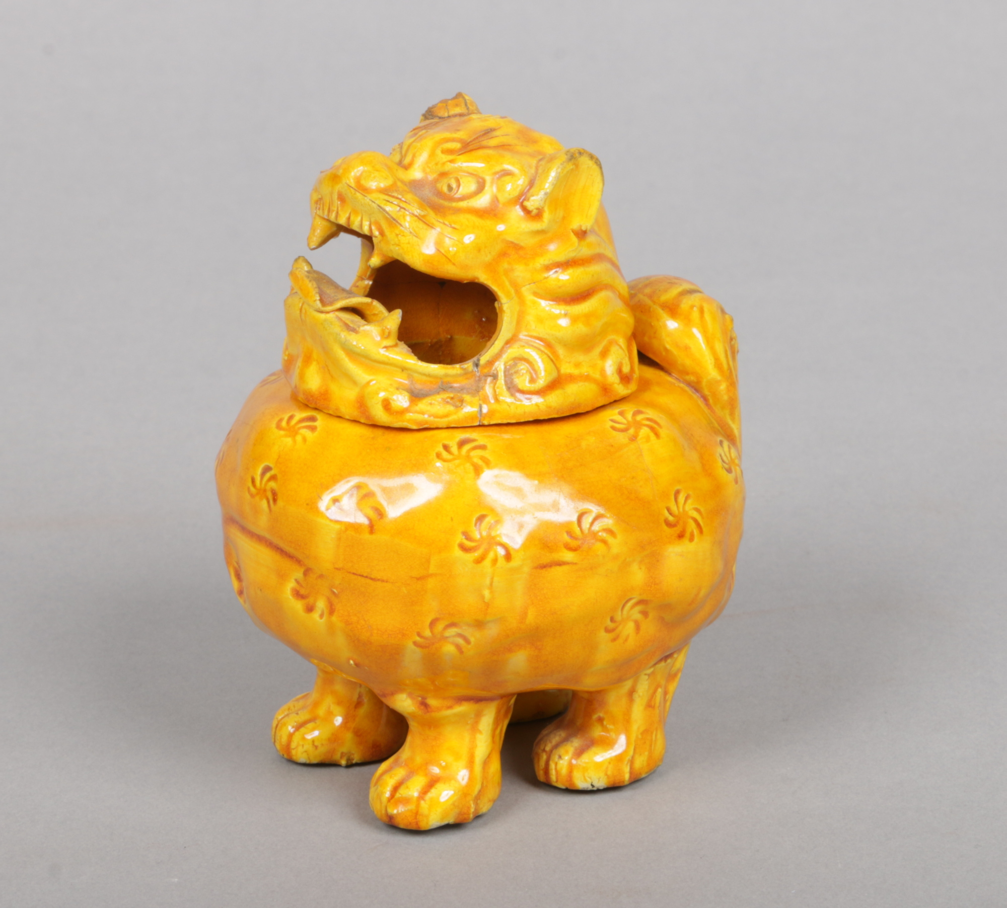 A Burmantofts Faience censor after a Chinese original formed as a Kylin with removable head.