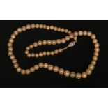 An antique cannetielle pinchbeck bead necklace, 47cm.