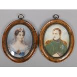 A pair of late 19th / early 20th century Ivory portrait miniatures of Emperor Napoleon Bonaparte and