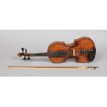 A 19th century German violin and a bow in modern case. No label bow stamped. Tourt F, 36cm.