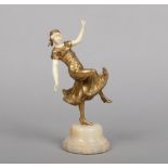 Georges Omerth (French fl. 1895-1925) an Art Deco gilt bronze and ivory figure of a dancing girl.