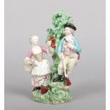 A Derby allegorical figure group emblematic of Spring and Winter. Coloured in enamels and modelled