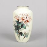 A Japanese Meiji period cloisonne high shouldered vase. Ground in pale yellow and decorated with a