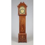An Edwardian Sheraton revival marquetry inlaid mahogany longcase clock. With a brass arch top dial