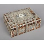 A 19th century Anglo Indian ivory and tortoiseshell mounted table box. With penwork decoration of