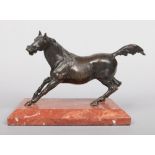 A 19th century Continental patinated bronze sculpture of a horse raised on a sienna marble plinth