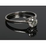 A platinum and old mine cut solitaire diamond ring. Diamond approximately 1.13ct, size R.Condition