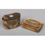 Two 18th century horn snuff boxes with hinged covers. One incised with a topographical scene and the