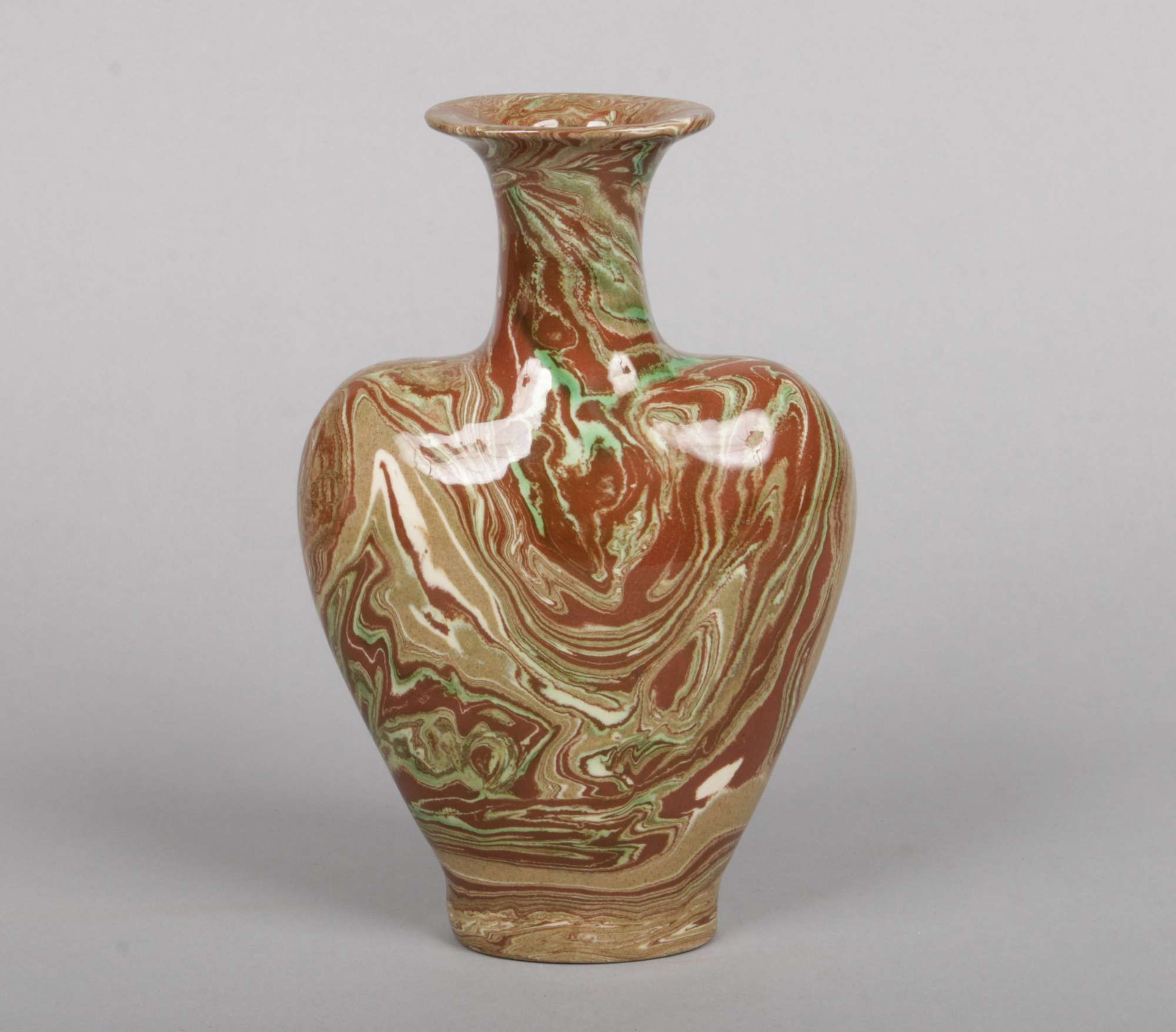 An agate ware flask shaped vase, J. T. Morton of Filey, 22.75cm.