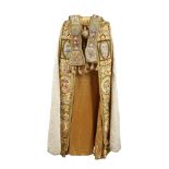 A silk and velvet Priests cope vestment with gold thread and raised embroidery depicting Saints