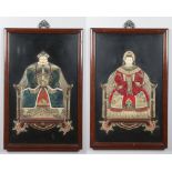 A pair of large 20th century Chinese wall hanging coloured composite plaques. Depicting portraits of