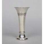 A George V planished silver vase of tapering form. Assayed Birmingham 1922, weighted, 18cm.