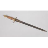 An 18th century German military double edged dirk. With brass pommel and cross guard. The blade with