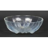 An Art Deco Sabino opaline glass bowl. Moulded with mussel shells, pearl swags and a star motif.
