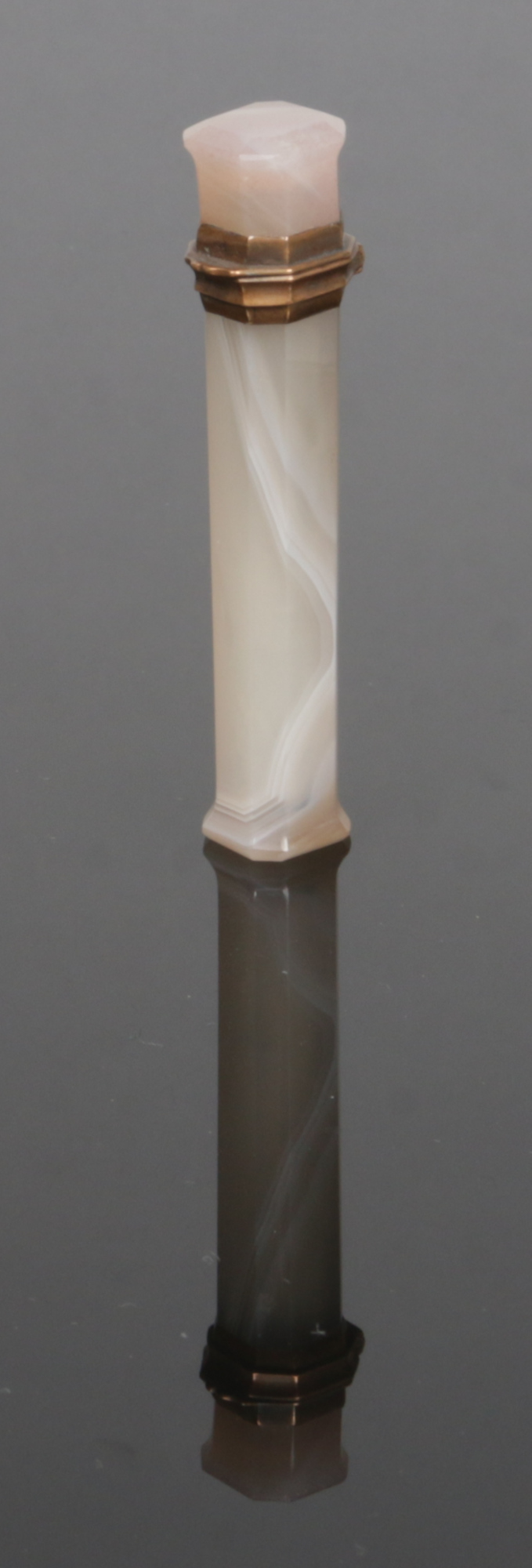 A carved white agate etui with gilt metal mount, 7.25cm.