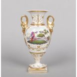 A Chamberlain's Worcester twin handled pedestal vase. Painted in coloured enamels with birds in a