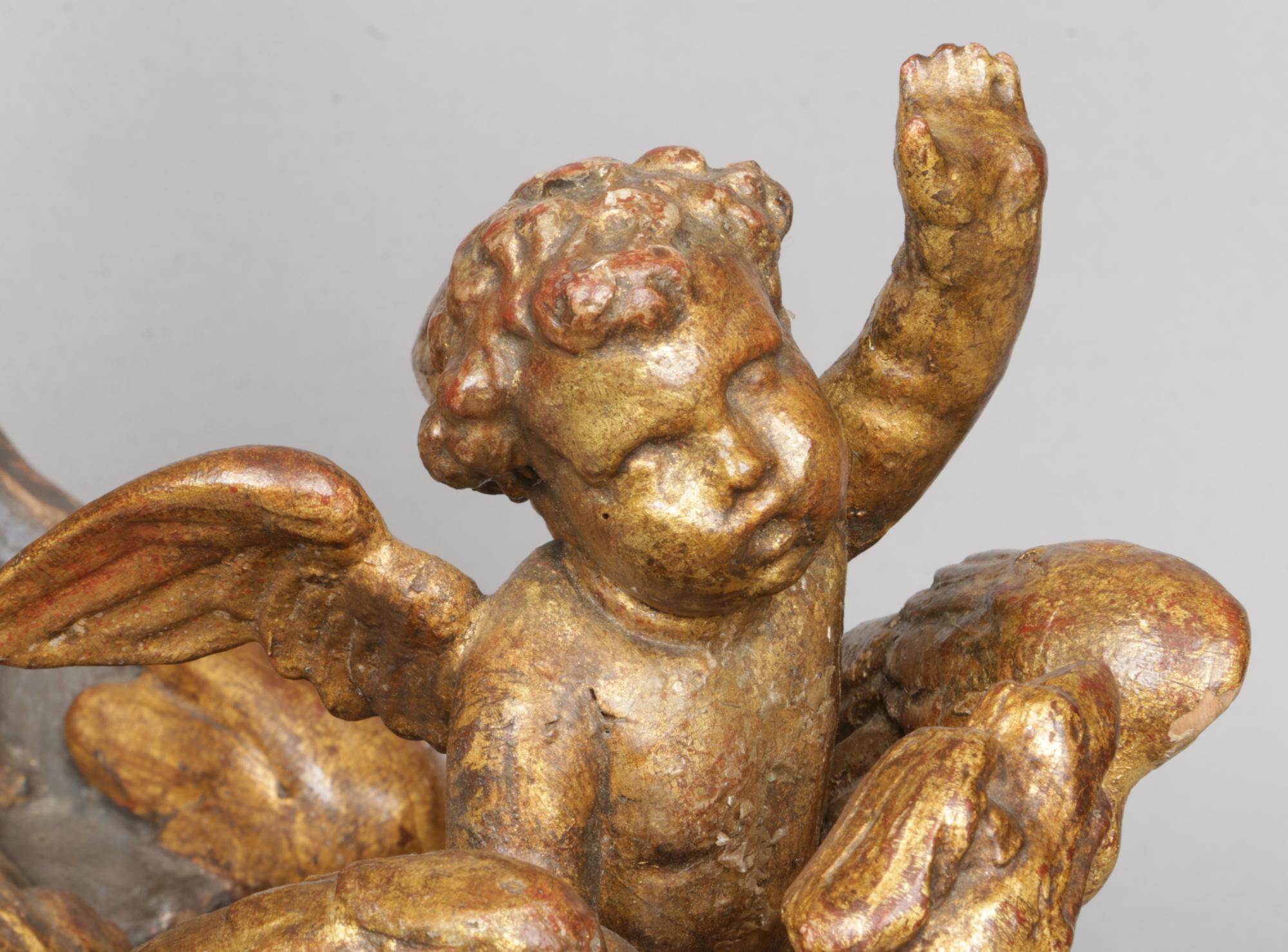 An antique Continental carved giltwood sculpture. Formed as two figures and a winged putti riding in - Image 3 of 4