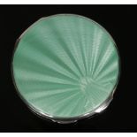 An Art Deco silver and green guilloche enamel powder compact by William Neale & Sons Ltd. Assayed