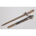 A 19th century German hunting sword in steel and leather scabbard. With antler grip, steel cross