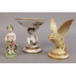 A Copenhagen porcelain tazza the support formed as a cherub on a dolphin, along with a Royal