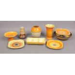 A group of Art Deco Shelley all decorated with orange glazes, mostly from the Harmony range,