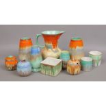 A group of Art Deco Shelley all with coloured drip glaze decoration including vases, storage pots,