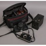 A quantity of photographic equipment including a Pratica B200 35mm SLR, Kodak No.2 Hawk-Eye model