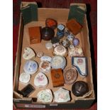 A collection of trinket boxes to include wood, porcelain, shell example etc.