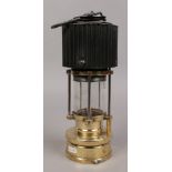 A Patterson type HCP miners lamp with corrugated bonnet.