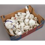 A box of crested ware to include Goss, Arcadian, Willow Art etc.