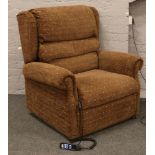 A brown upholstered Deltadrive DSI electric riser / recliner arm chair by Okin.