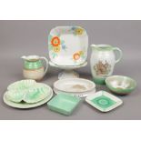 A group of Art Deco Shelley including cakestand, water jugs, bowls etc, some from the Harmony range,