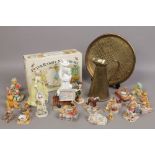 Two china figurines including Coalport Golden Age, a boxed Wedgwood Peter Rabbit nursing set,